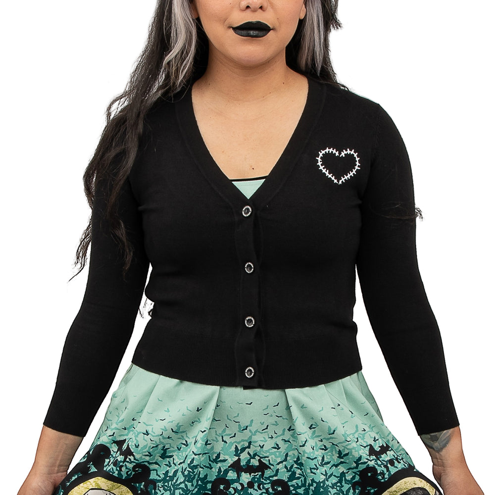 Universal Monsters Stitch Shoppe "Alexis" Cropped Cardigan Sweater Front Closeup View on Model-zoom