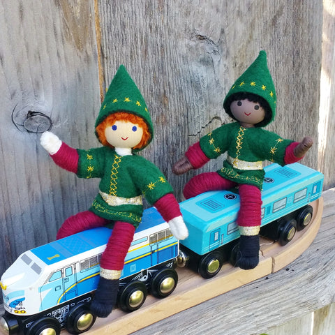 Kindness Elves Riding a toy train