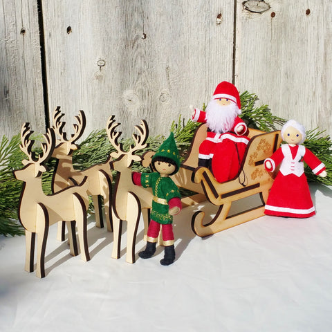 Kindness Elves with Santa, Mrs Claus, sleigh and reindeer