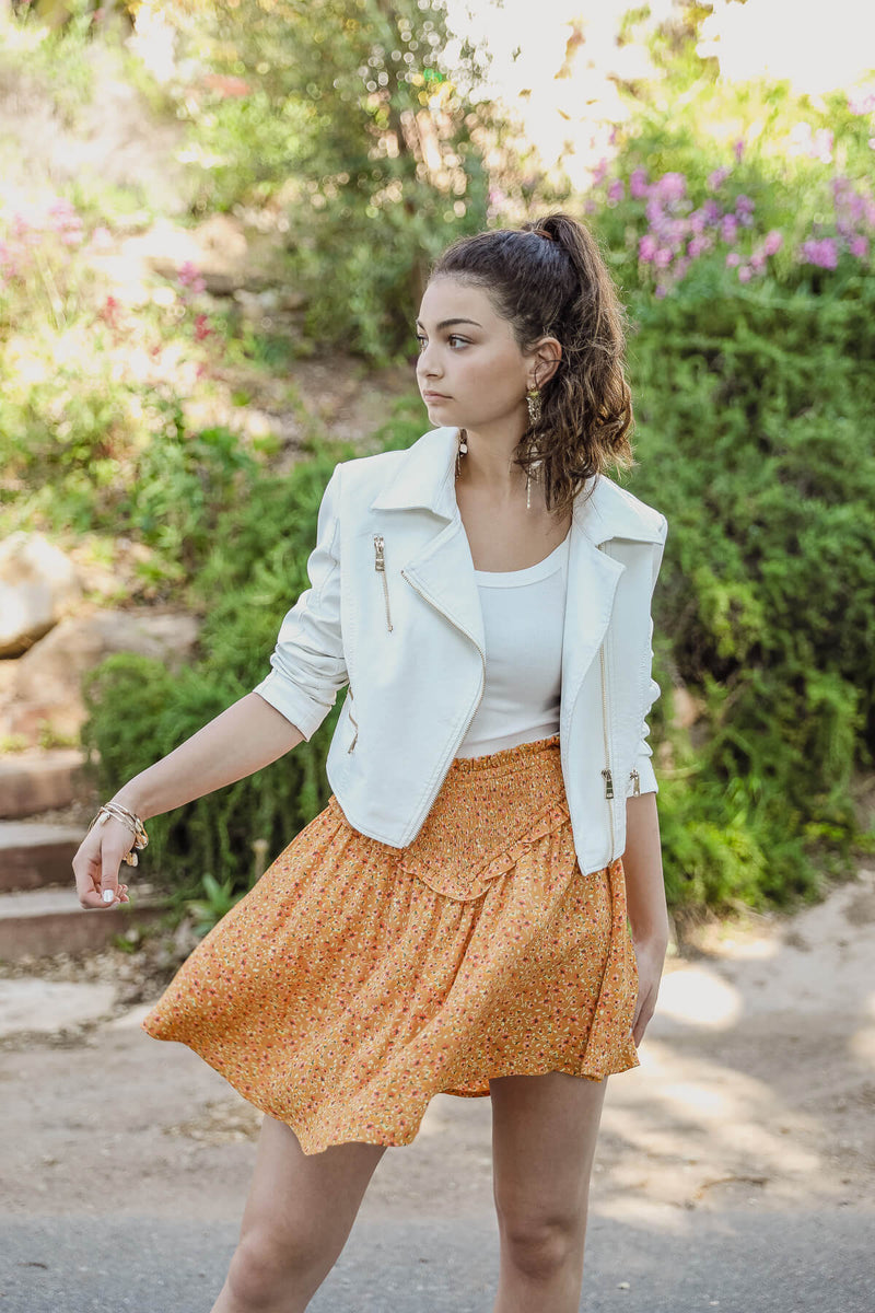 White leather jacket with gold zipper