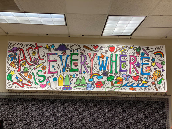 colorful school decor hanging from the ceiling 