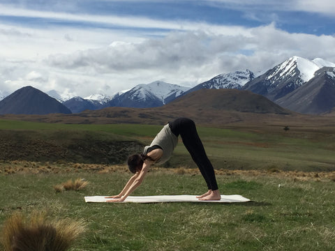 Dana McKenzie in on yoga pose outdoors - Pure NZ Wool Yoga Mat - Yolana | Eco Yoga Store