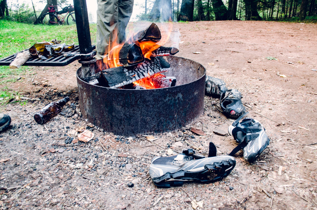 Drying our riding shoes around the campfire at East Twin Lake