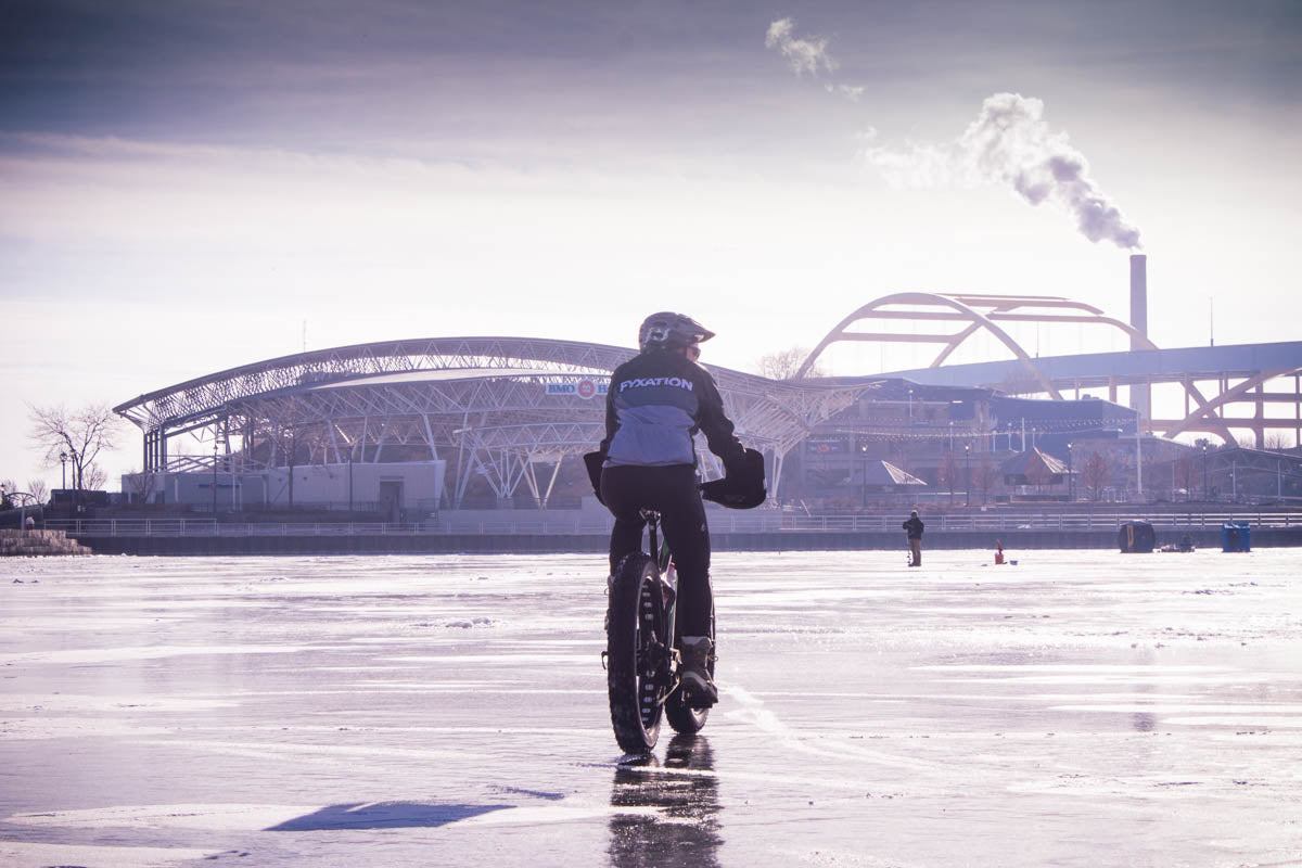 Fat biking on ice with Dillinger 4 studded fat bike tires on frozen Lake Michigan.