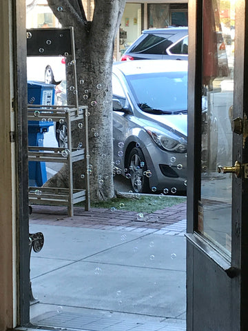 bubbles are seen through Periwinkle's front door