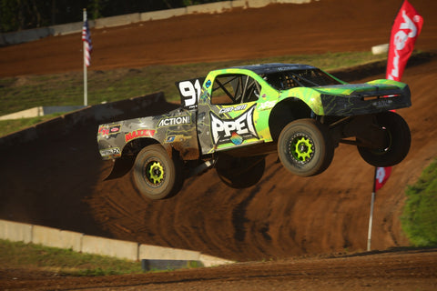 Kyle Chaney jumping Pro 4 Offroad Truck at ERX