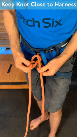 Keep knot close to harness