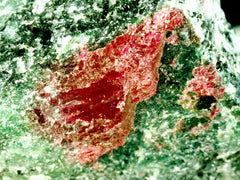 Tanzania - ruby rough in green mineral