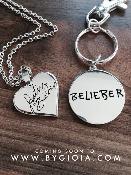Justin Bieber necklace and Justin Bieber keyring.  Brand new Justin Bieber Belieber merchandise 2016