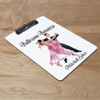 Clipboard with well dressed for ballroom dance couple in dance position looks like quickstep maybe custom text above and below the image