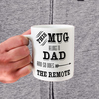 11oz mug says This Mug Belongs to dad and so does the remote