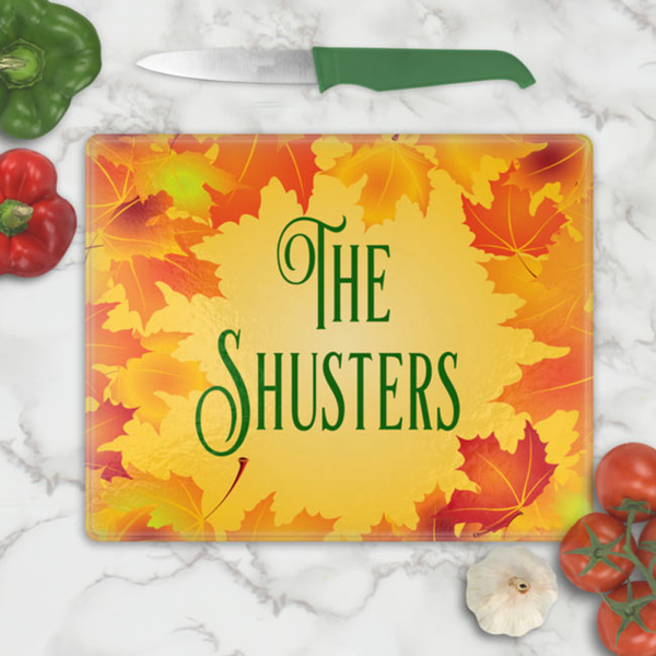 Autumn colorful leaves boarder your custom text on a tempered glass cutting board