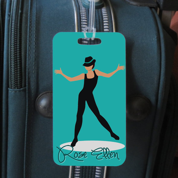 Jazz Dancer wearing black leos and hat on tealish green background.  All jazz dance tags have this design.  sports bag tag front side with name
