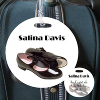 4 inch round tap theme bag tag with name on side 1 and contact info on side 2