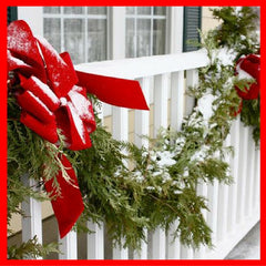Christmas garland on porch railing