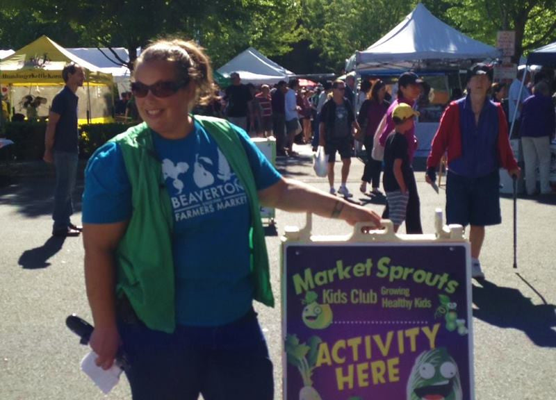 Jodi Monroy of Mixta Words preparing to meet guests at Beaverton Night Market