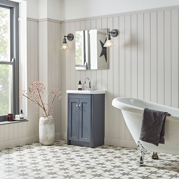 Grey and cream bathroom interior with vintage lights