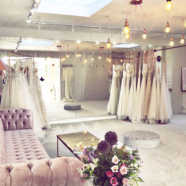 Pink bridal shop in Somerset with industrial lighting