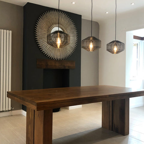 Japandi inspired dining room interior with handcrafted pendant lights