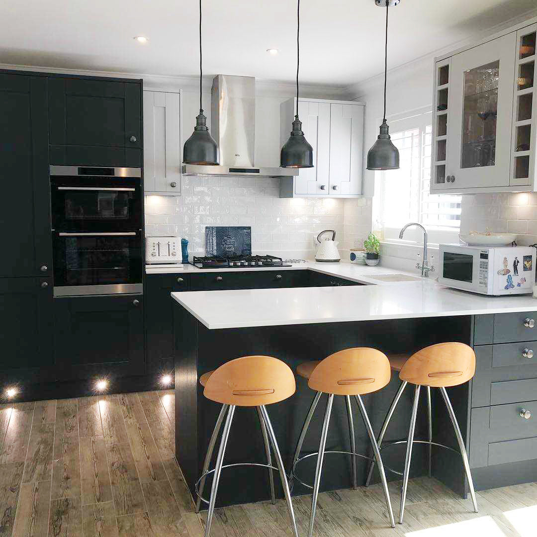 Dark kitchen interior with industrial lights