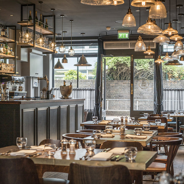 The Coal Shed Brighton interior with statement glass lighting