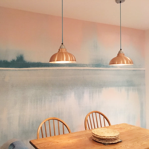 Coloured fabric flex and vintage lights in a dining room