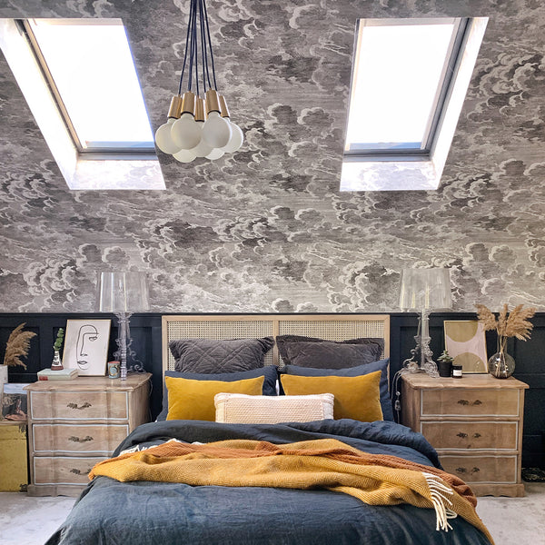 Hanging modern chandelier in a bedroom