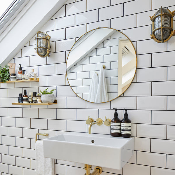 Bathroom with mirror and floating shelves