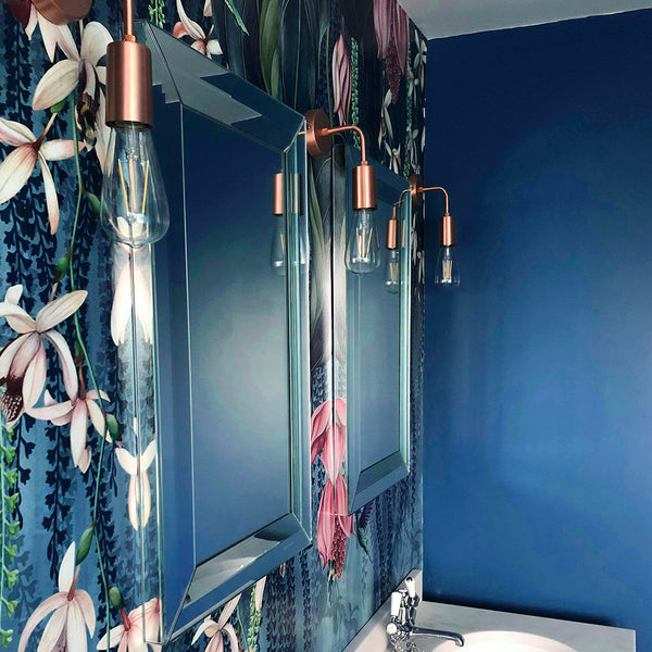 Patterned bathroom wall paper with copper lights
