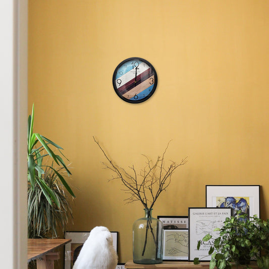 Colorful Indoor Round Wall Clock on Yellow Wall