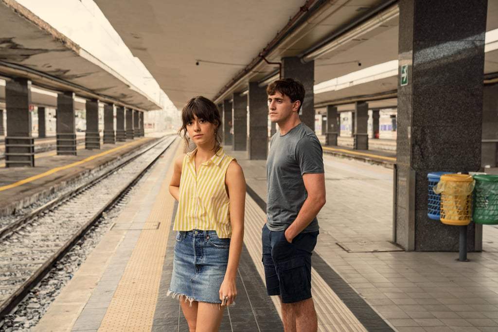 Marianne in yellow striped shirt and denim skirt