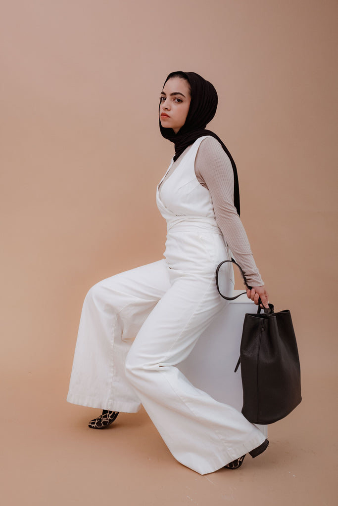 female model with leather bag