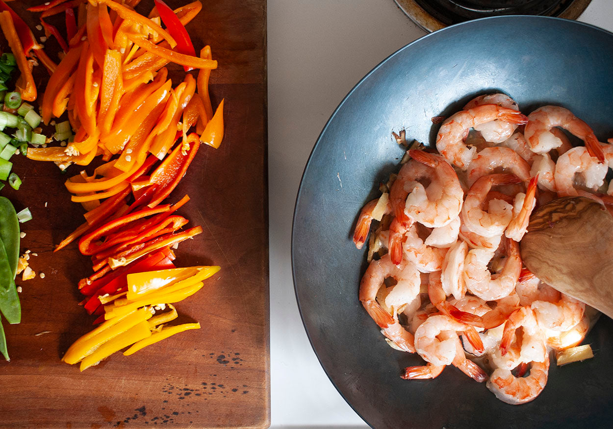cook the shrimp in your studio weyh carbon steel wok before adding the rainbow of vegetables for this healthy and quick weeknight stir fry
