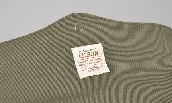 filson label close up padded computer bag