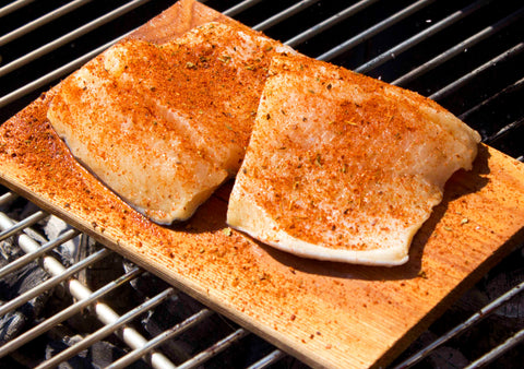 Rainbow trout on a plank