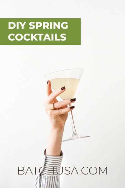 "DIY Spring Cocktails, BatchUSA.com" Woman's hand holding margarita glass with cocktail inside on white background | DIY Spring Cocktails by Caia Cummings at Batch