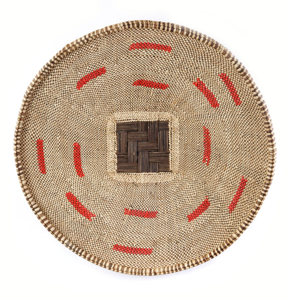 This beautiful finished Choma basket is woven from palm fronds and red recycled, single use plastic bags. 