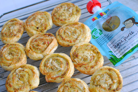 pinwheels and a reusable pouch filled with veggie puree