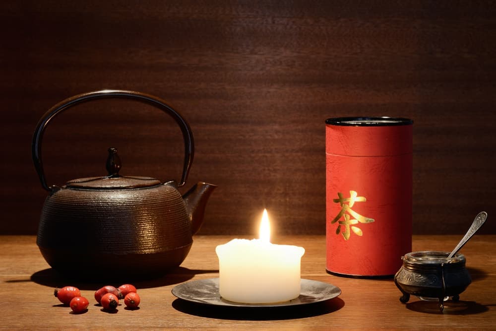 japanese medicine pot of tea and mixture of herbs