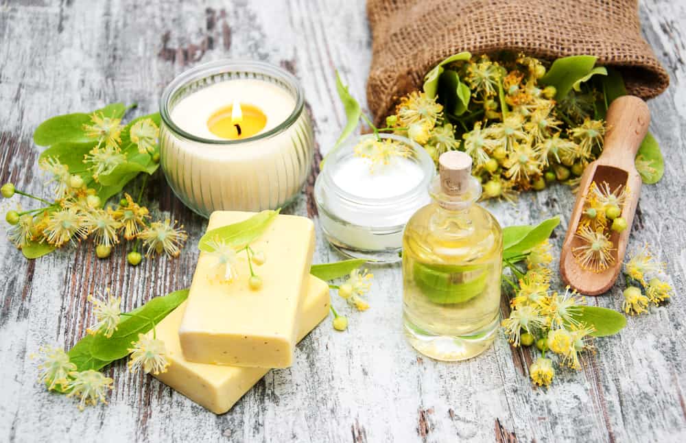 Spa products with linden flowers on a table