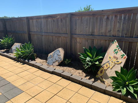 Horse Mosaics On Sandstone In Garden