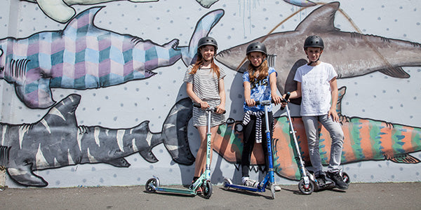 Cool kids with their scooters