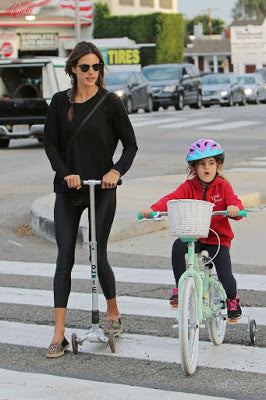 Allesandra Ambrosio's daughter scooting on a Micro Scooter