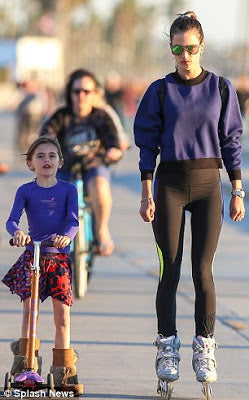 Allesandra Ambrosio's daughter scooting on a Micro Scooter