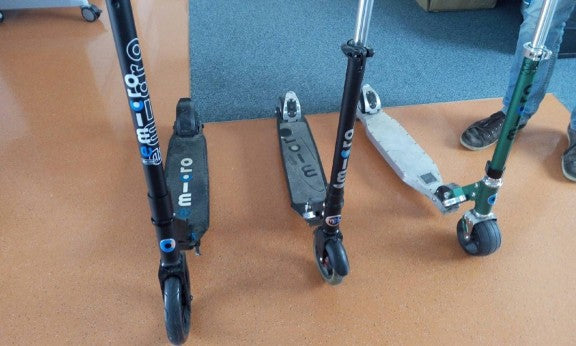 A range of Micro scooters and the new emicro one