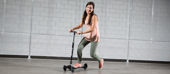 Girl scooting on her Micro scooter