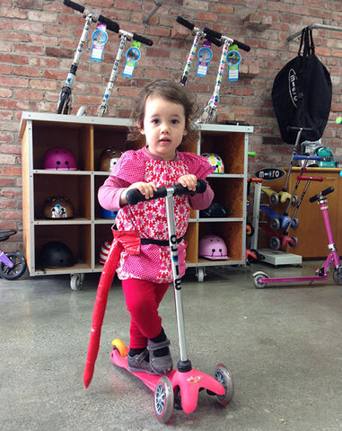 Pippa on her pink Mini Micro preschool scooter