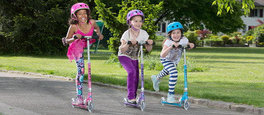 Kids having fun together on their Micro Scooters