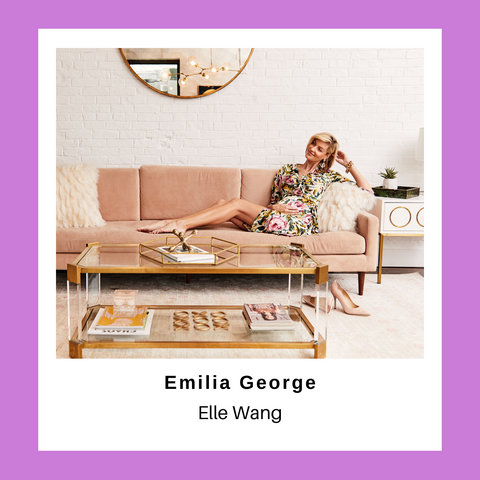 pregnant woman laying on a couch with a coffee table in front of her