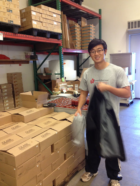 Our first pallet of ketchup, building in progress… Xiao you look handsome